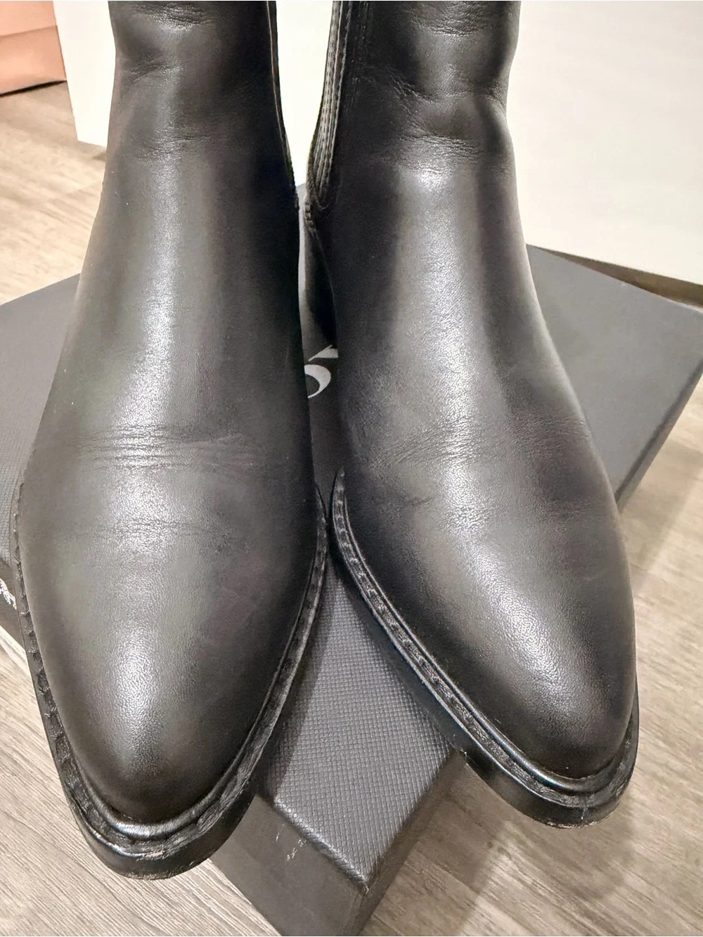 Coach black wear care